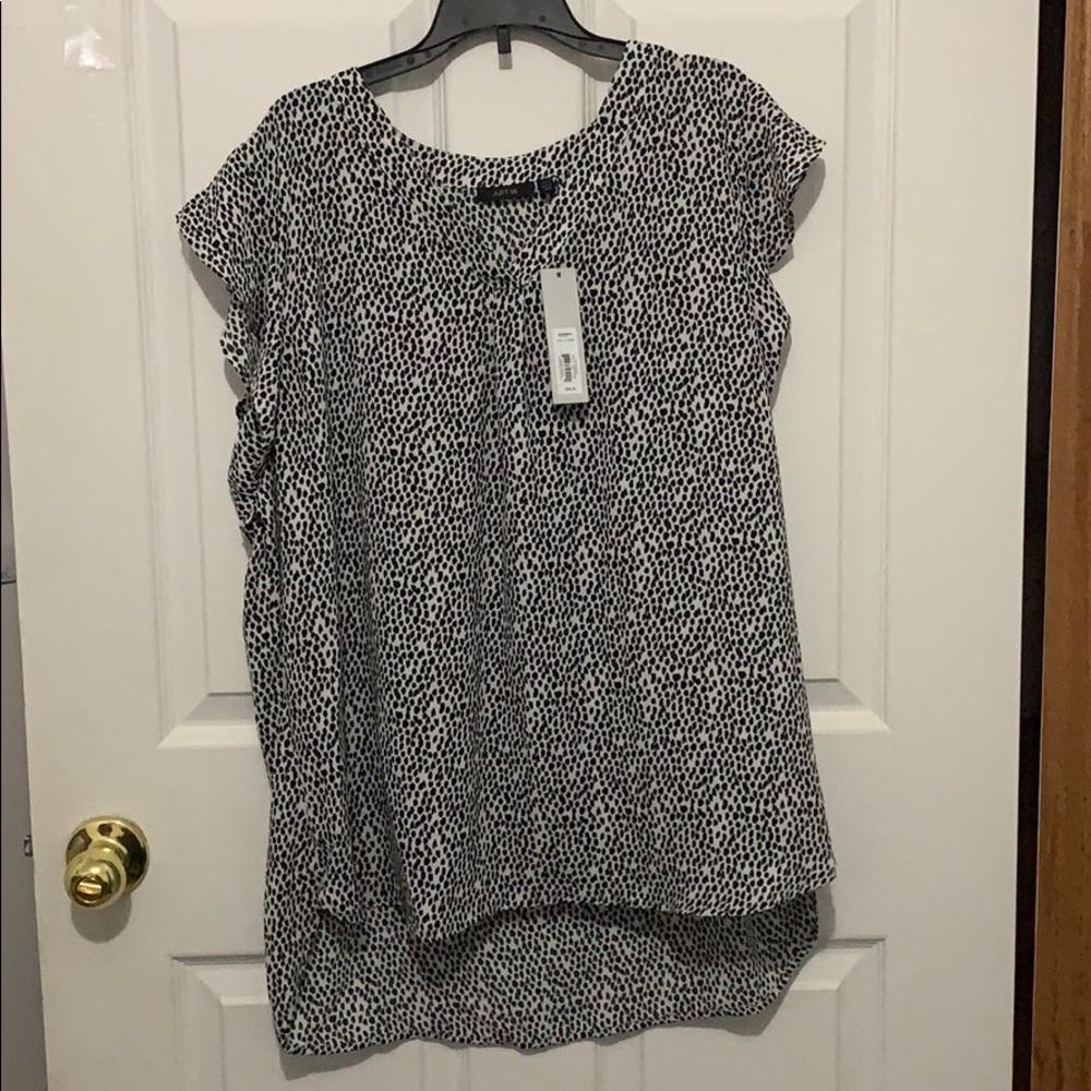 Women’s black and white blouse